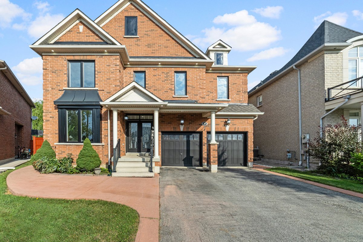 The brick exterior and front entrance of a two-storey GTA home