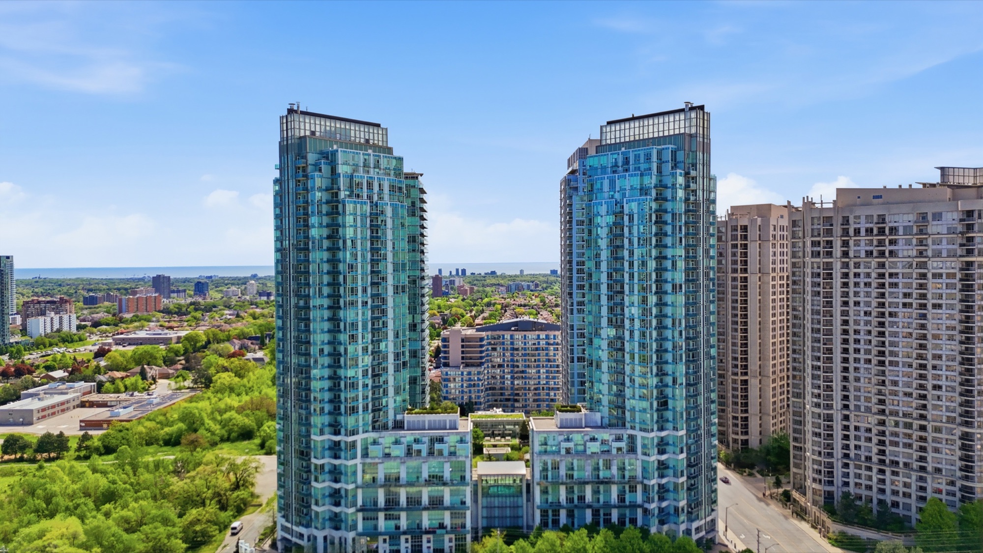 Aerial view over Mississauga City Centre, from our own footage