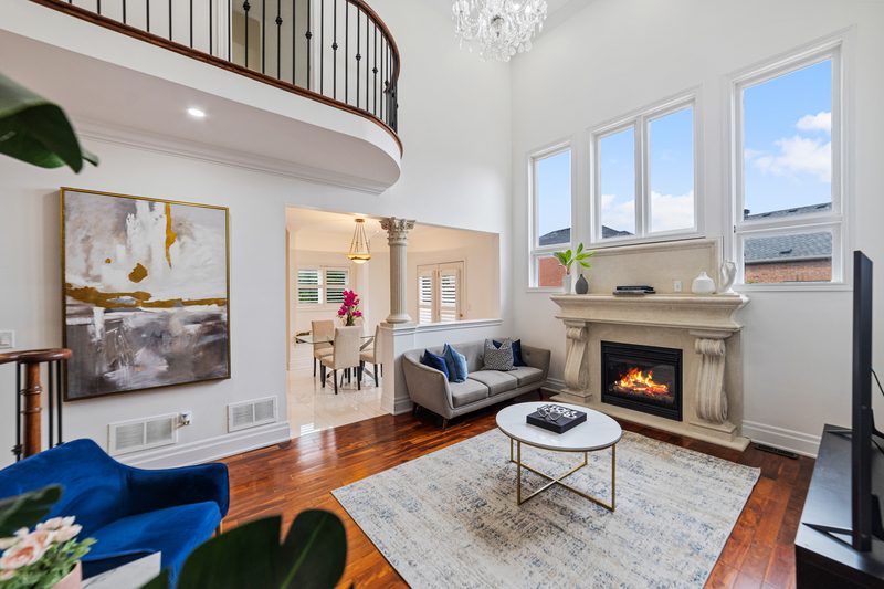 18 Regis Circle, Brampton: living room with fireplace and open loft above